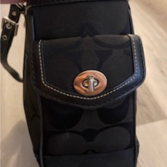 It’s a large signature C coach logo printed all over it - Picture 4 of 15